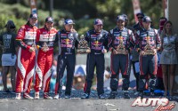 Podio del Dakar 2016 en la categoría de coches, celebrado en Rosario (Argentina). De izquierda a derecha: Dirk Von Zitzewitz, Giniel De Villiers (Toyota), Jean Paul Cottret, Stéphane Peterhansel (Peugeot), Nasser Al-Attiyah y Matthieu Baumel (Mini).